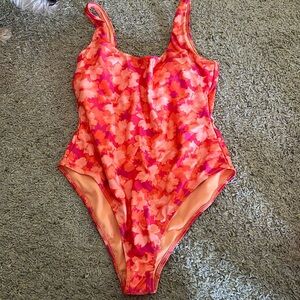 Floral orange and pink one piece swimsuit from Charolette Russe